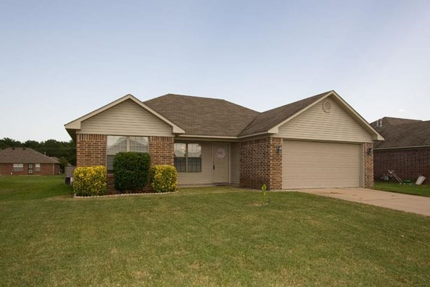 All brick three bedroom two bath home, close to schools and shopping.. See agent remarks.