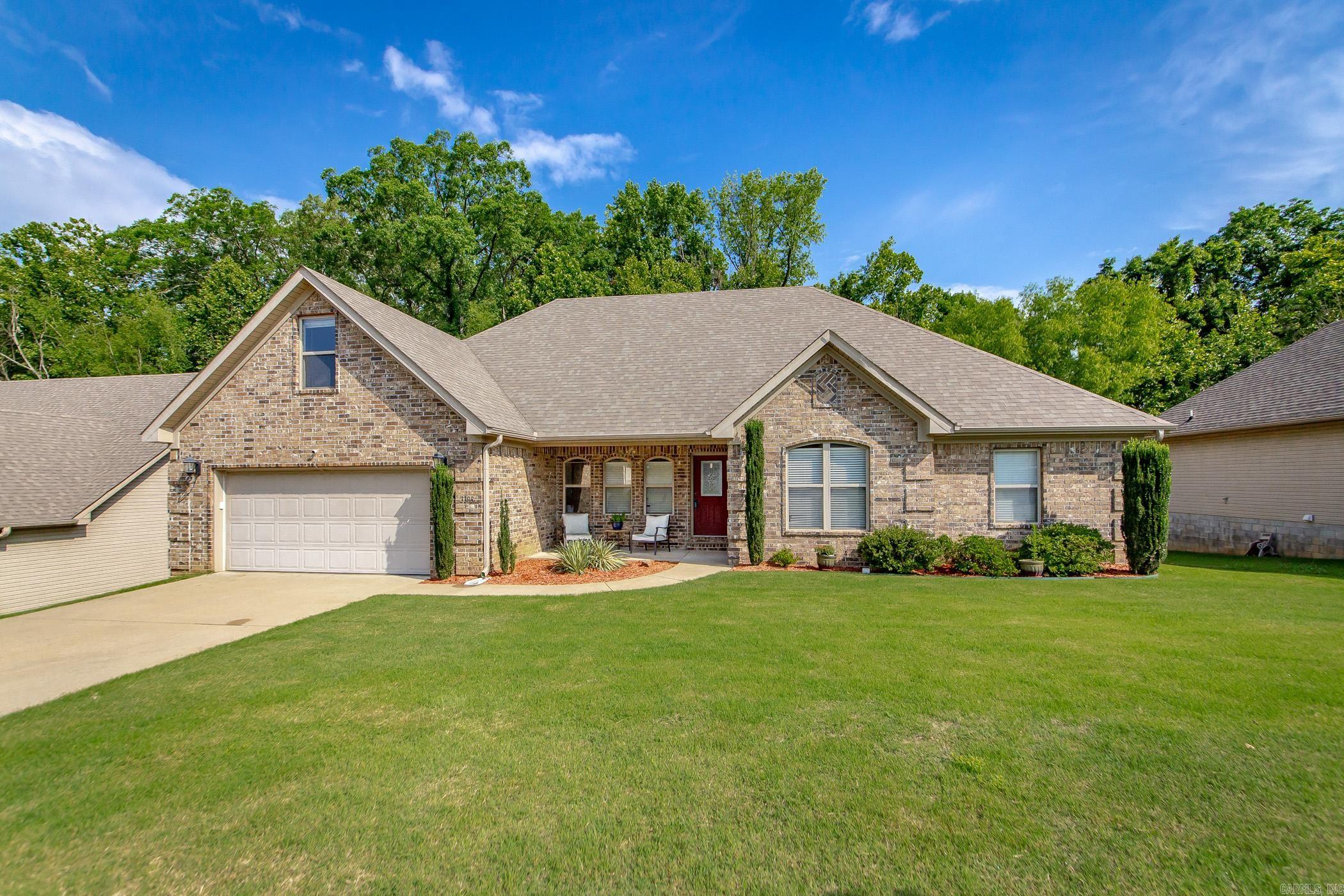 Exclusive gated area. One owner home. Walk into the open living and formal dinning area, open to the cabinet filled kitchen. Beautiful hardwoods! Assess to the house length back deck, for entertaining, wooded back yard! Fireplace, vaulted ceilings! Split bedroom plan, gives the master bedroom privacy, also has access to deck. Shower and jetted tub in master bath, walk-in in closet. Separate laundry room. A bonus room upstairs over garage, makes for a great area for what ever you need, it is a bedroom now, could be a movie room or office. Roof is two years old, double car garage. Flat level yard, with slope in rear. Very private back yard and deck. Selling as is but welcomes inspections. Seller's disclosure is on line. Priced to sell. Home does need new carpet. Sq.Ft. is from court house, feel free to measure. Easy to show, not vacant.