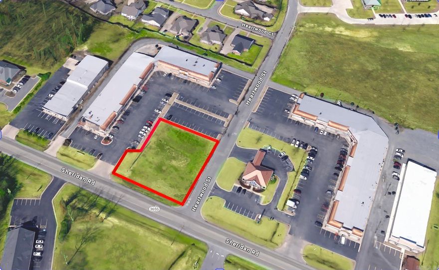 LOCATION!  LOCATION!! LOCATION!!!  Fantastic vacant commercial land lot with 131' of road frontage, no restrictions and over one-half an acre of land.  Perfectly positioned between a strip mall and Sheridan Road.   This would make a great location for a drive-thru, a coffee or donut shop - just to name a few!   The sky is the limit with this property!  Seller can build to suit.