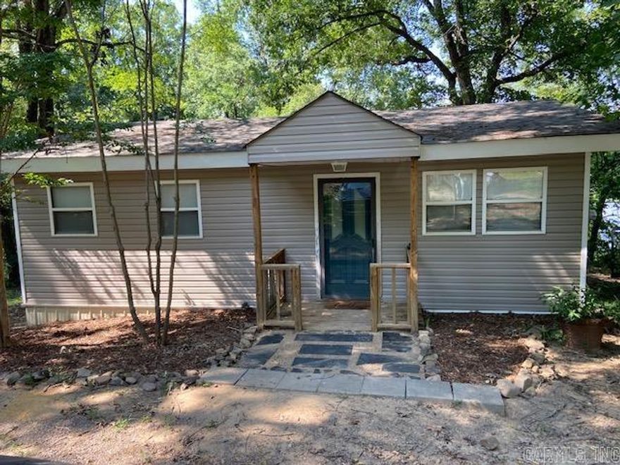 Harris Brake Lake.  Walk out your back door and cast your line. Perfect Fishing Cabin.  Remodeled nicely, boat dock, nice storage building, open kitchen with vaulted ceiling, new paint, exterior siding and newer roof, lots of extra space. Refrigerator, washer & dryer to remain.  Storage under house, too. SF is estimated. You better hurry, this one will be gone quick.