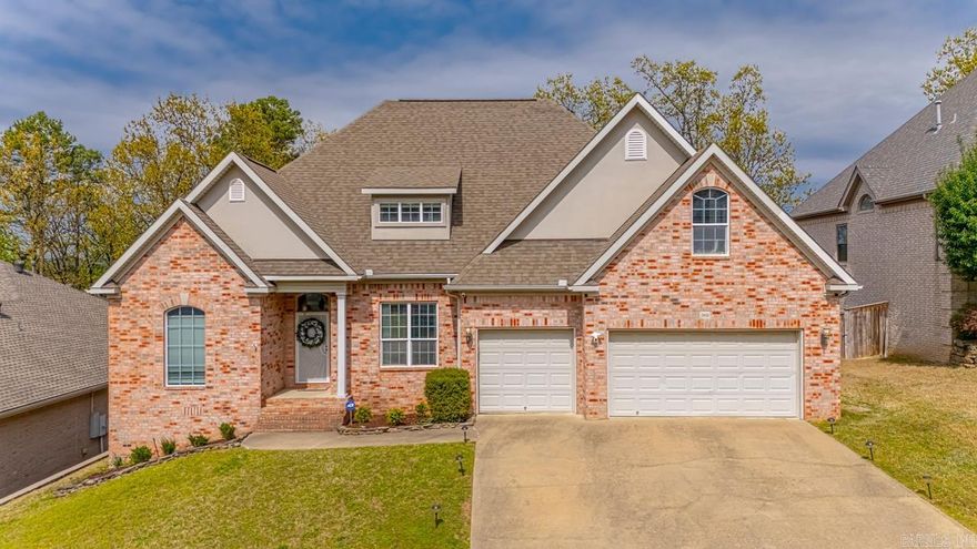 Rare, beautifully updated 5BR/3.5BA home with 3-car garage, peaceful mountain views, and spacious flat backyard in a top-rated school zone! Main level offers a serene primary suite with a spa-like remodeled shower, guest bedroom, half bath, open-concept living, site-finished hardwood floors and a butler’s pantry. Upstairs features a junior en suite, two additional well-appointed bedrooms, full guest bath, oversized bonus room, dedicated craft room, and walk-out attic. Upgrades include new interior paint throughout, an EV charger, and 4 new HVAC units (2024). Ideally located just minutes from hiking and biking trails, premier shopping, and top dining, this home offers an exceptional layout, modern finishes, and endless entertaining potential — a must-see in 72212!