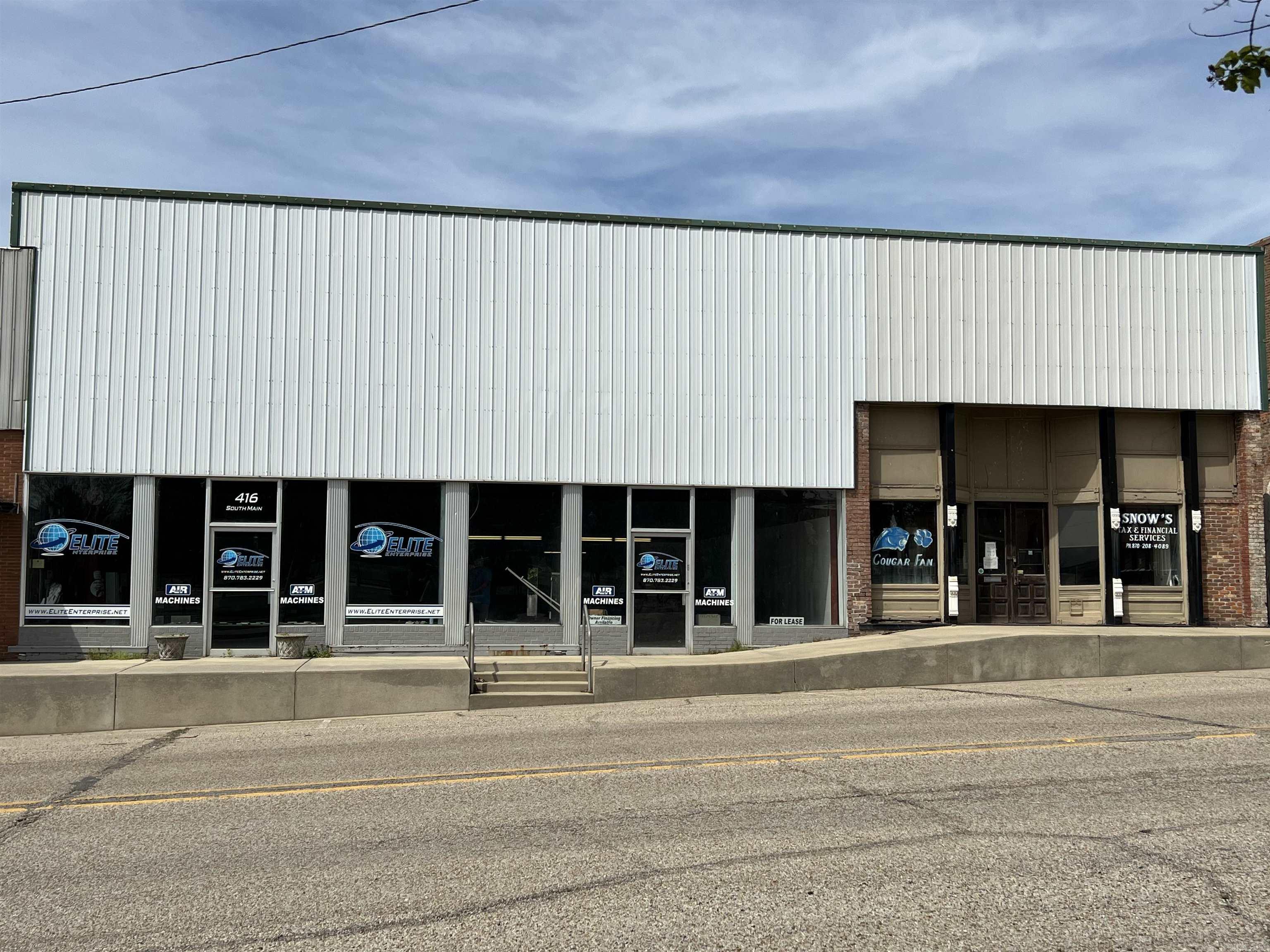 Attention entrepreneurs! There is an incredible opportunity to own a large building on Main Street in Rector for under $100,000! The main building is 3,600sqft and has had a wall built in the center essentially turning this into two different store fronts, if you wanted, with a 960sqft garage attached to the rear. The wall could be easily removed as it provides no structural integrity to the building. Also included in the sale of this property is 416 S. Main Street and 412B S. Main Street. Both 416 and 418 are connected in the interior with a doorway that allows you to easily pass from one to the other. 416 S. Main St. has a small office at the front that is 572sqft with 1,508sqft of unfinished space in the rear. There is no HVAC installed in the building but it has been plumbed for it. There is electrical throughout! This property is ready to become the home to your next business! Very negotiable and ready to sell! The owner is willing the lease the property.