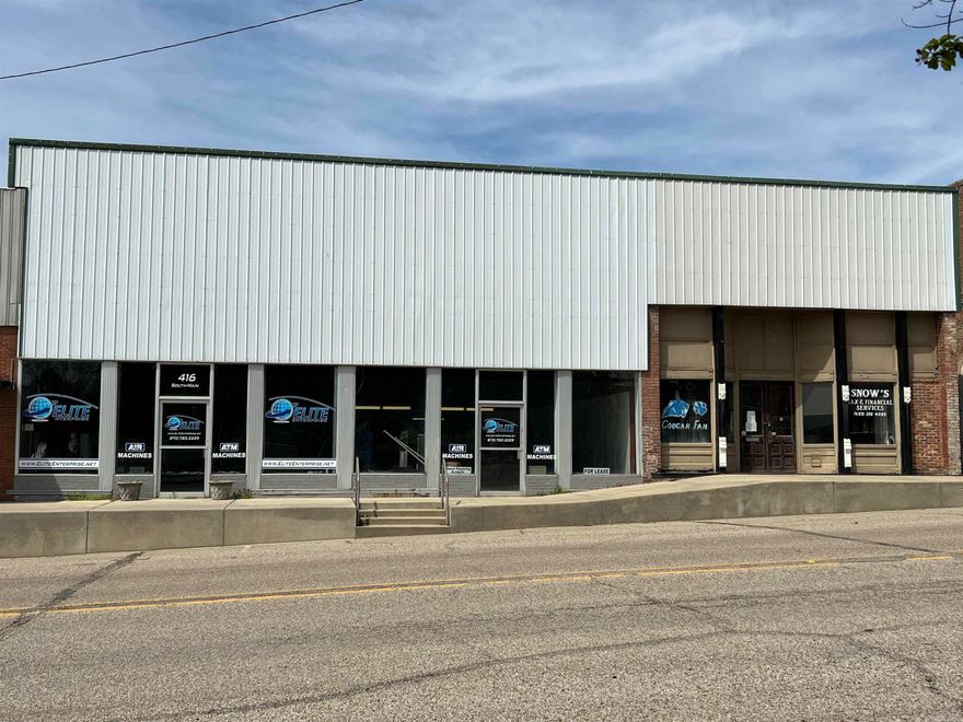 Attention entrepreneurs! There is an incredible opportunity to own a large building on Main Street in Rector for under $100,000! The main building is 3,600sqft and has had a wall built in the center essentially turning this into two different store fronts, if you wanted, with a 960sqft garage attached to the rear. The wall could be easily removed as it provides no structural integrity to the building.   Also included in the sale of this property is 416 S. Main Street and 412B S. Main Street. Both 416 and 418 are connected in the interior with a doorway that allows you to easily pass from one to the other. 416 S. Main St. has a small office at the front that is 572sqft with 1,508sqft of unfinished space in the rear.   There is no HVAC installed in the building but it has been plumbed for it. There is electrical throughout! This property is ready to become the home to your next business!   Very negotiable and ready to sell!   The owner is willing the lease the property.