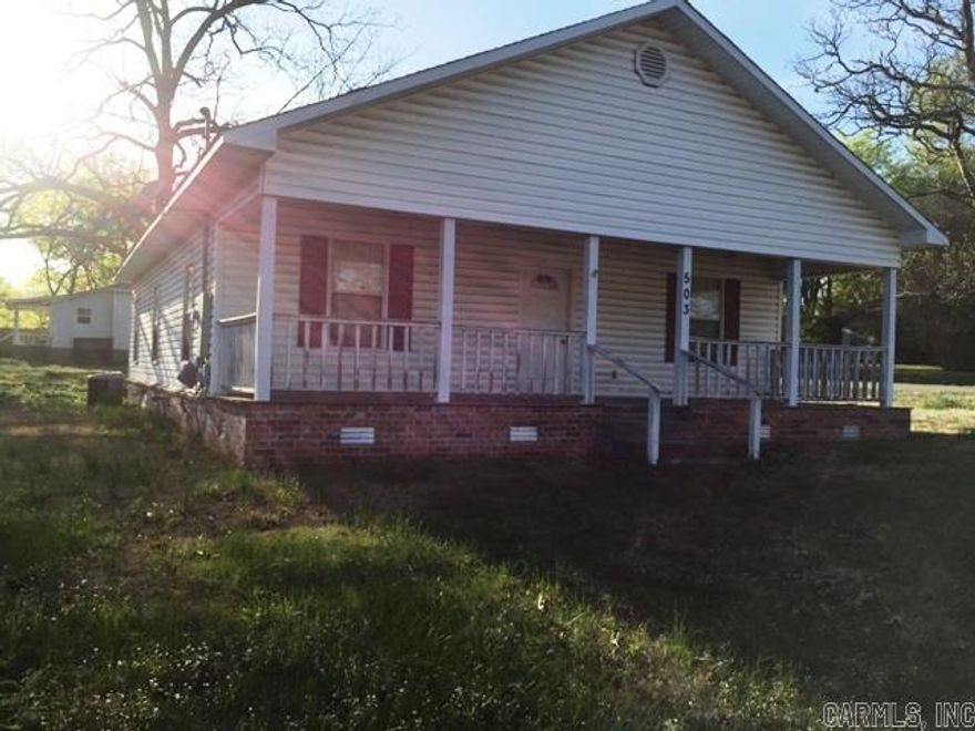 Great house. Need some TLC. Sets on a large lot just one block from the park and two blocks from Benton Schools.  Price subject to bank approval.  Agents please see remarks.....