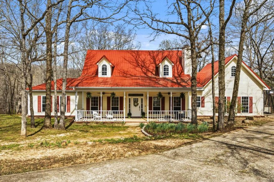 Discover the serene lifestyle offered at 35 Kelly Court, Cabot, Arkansas—an exceptional property nestled on 3 wooded acres with ATV trails and convenient creek access. This charming home boasts four bedrooms and two and a half bathrooms, complemented by two versatile multi-purpose rooms. Recent updates include new carpet and fresh paint throughout, enhancing the home's inviting atmosphere. The cozy living space features a cast iron wood-burning fireplace insert, perfect for chilly evenings. Outdoor enthusiasts will appreciate the 3-foot deep garden beds filled with super soil and equipped with a soaker hose, ideal for cultivating vibrant gardens. A new metal roof with an expansive deck offers a perfect spot for relaxation or entertaining. Additional features include an extra building on the property and a modern refrigerator with a Keurig K-Cup dispenser. Embrace the tranquility and unique amenities of this remarkable property. There is truly nothing like it!