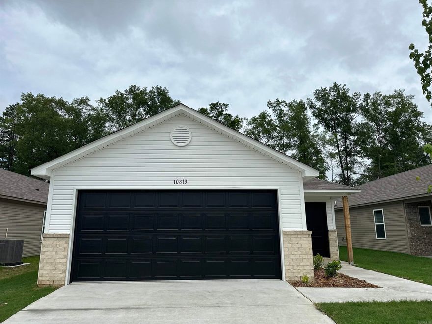 The Mitchell plan is a new favorite! The entry welcomes you into a large Living Room that flows into eat-in Kitchen, and the back door opens onto a covered patio. The Master Bedroom is located to the rear of the home for more privacy, and just steps from the Kitchen for ultimate convenience. Bedrooms 2 & 3 are just steps from their shared hallway Bathroom. Come visit it today!  Thoughtful upgrades included in home: plumbing faucet upgrade 2, 8" deep Kitchen sink, door bell, added cable jack, HVAC rigid duct upgrade, crown on Kitchen cabinets, cabinet hardware level 1, flush laminate bar top in Kitchen, Luxury Vinyl Plank flooring in wet areas and Living Room and adjacent hallways, raised ceilings in Living Areas per municipal requirements, Cheyenne style doors, baseboards level 2, 25in. wide attic stairs, LED disk lights in Kitchen, full sod, stainless steel appliance package.    *** AGENTS, PLEASE SEE AGENT REMARKS OR SHOWING REMARKS. ***  THIS HOME IS SCHEDULED TO BE COMPLETE IN LATE APRIL.