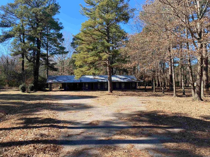 3 Bedroom / 2 bath ranch-style home on wooded 2.7-acre lot in Hamburg. Sheetrock walls and LVT flooring throughout. Open living/kitchen/dining. Woodburning fireplace.  New light fixtures in living room and kitchen. Updated bathroom vanities. 20x24 insulated shop. Large carport. Additional upgrades include (2015) Electric Hot Water Heater; (2021) Metal Roof, Dishwasher; LVT Flooring; (2022) Central HVAC, Wall Oven; (2024) Cooktop.