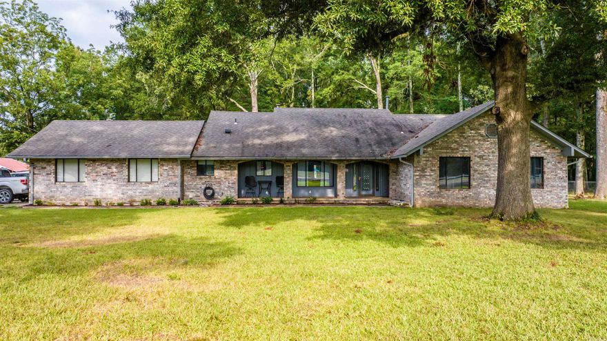 Welcome to your own private oasis! This stunning 3 bedroom, 2.5 bathroom home sits on a sprawling 10-acre lot, surrounded by nature and offering breathtaking views in every direction.  The kitchen boasts modern appliances and ample counter space, making meal prep a breeze. The bedrooms are generously sized, with plenty of closet space for all of your storage need and his and her closets in the master.  With 2.5 bathrooms, you'll never have to wait in line for the shower! Master bathroom includes 3 vanities, jetted tub and tiled shower. Outside, the possibilities are endless. Whether you enjoy gardening or simply taking in the beauty of nature, this property has something for you. Home includes 3 car shop with Heat and compressed air, greenhouse, chicken coupe, small goat barn, gas tankless hot water heater. See agent remarks.