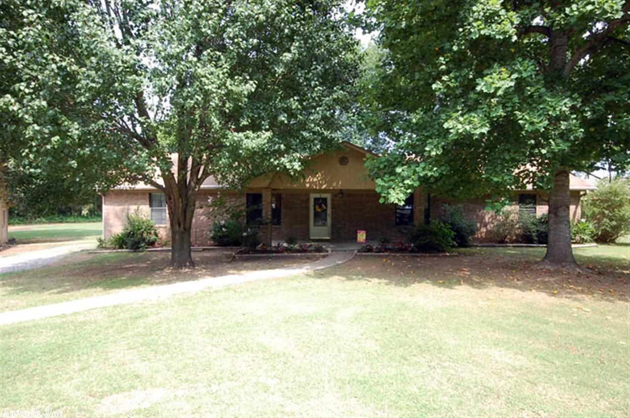 Country living at it's finest! Nestled back in a cul-de-sac on almost 1 acre, this 3 bedroom, 2 bathroom home features almost 1,800 square feet, a large living area with a nook, an open living/dining room area, and a split floor plan. It also has a detached garage/shop. This home is a must see to appreciate!