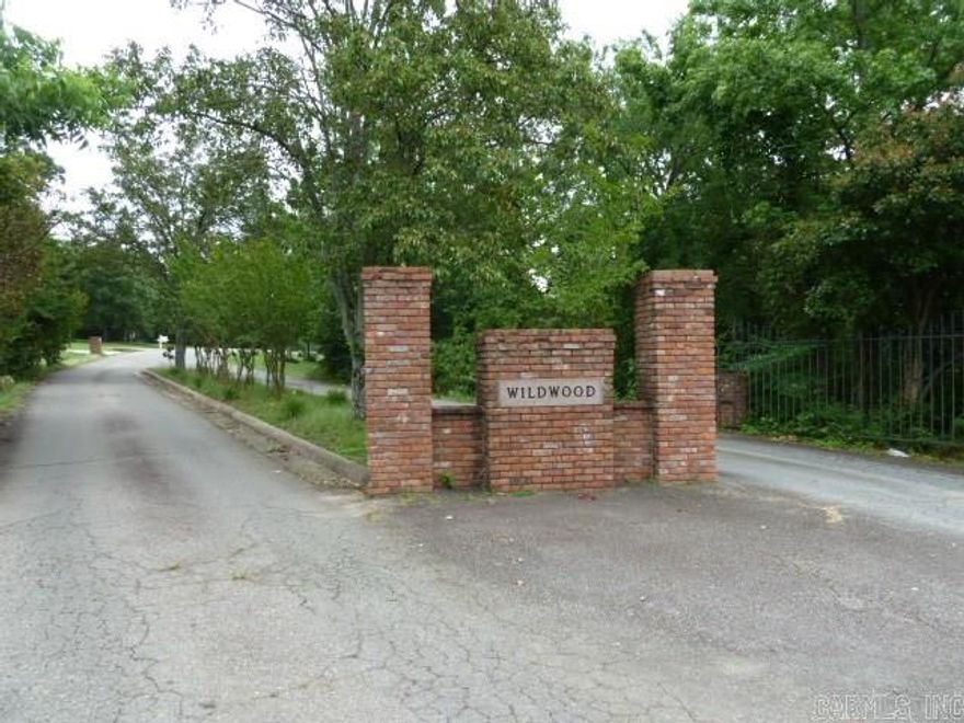 Sloping lot with Hardwoods, great neighborhood.