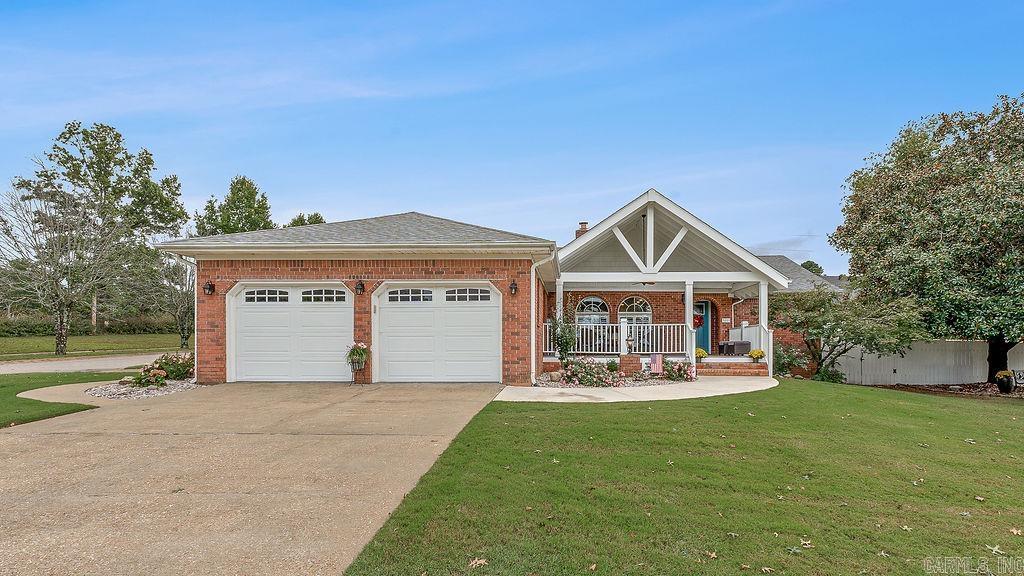 Welcome to this charming gem in the heart of Club View Estates! This beautifully updated home offers a spacious two-car garage, plus an additional golf cart garageāperfect for those quick trips to the golf course just across the street. Step onto the brand-new covered front porch and enjoy the privacy of a fenced corner lot with a handy storage building and a covered back deck for relaxing or entertaining. Inside, you'll find a bright, airy living area with abundant natural light, a cozy brick gas fireplace, and an inviting dining space. The stunning custom kitchen has been fully renovated, featuring sleek white cabinetry, quartz countertops, and brand-new appliancesāideal for culinary enthusiasts. The primary bathroom has been tastefully remodeled with a luxurious tile shower and jetted tub, while the large den off the living area comes complete with a convenient half bath. The home boasts new windows throughout, fresh paint, modern can lighting, and a host of additional updates that make this property truly move-in ready. Don't miss out on this perfect blend of comfort and style!