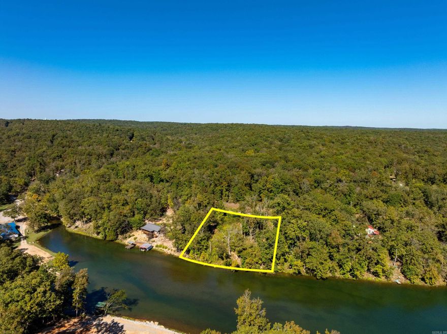 Two Side-by-Side Lots on Vagabond Lake – Build Your Ozark Getaway! Two adjacent lots on peaceful Vagabond Lake near Hardy, Arkansas, offer the perfect blend of water access, small-town charm, and Ozark beauty. Ideal for a cabin, full-time home, or weekend retreat near the Spring River and historic Hardy. Enjoy quiet mornings by the lake, easy paddling, and fishing right in your neighborhood. Buy one or both lots for extra space, a larger homesite, or a home plus shop or guest cabin setup. These buildable parcels suit many styles—from cozy lake cabins to modern cottages with porches made for sunset views. Located just outside Hardy, you’re minutes from Main Street shops, dining, groceries, and the Spring River’s year-round fun. Vagabond Lake is known for calm waters, wildlife, and relaxed recreation—perfect for kayaking, canoeing, and peaceful living. Buyer to verify lot sizes, utilities, setbacks, and HOA/lake rules.