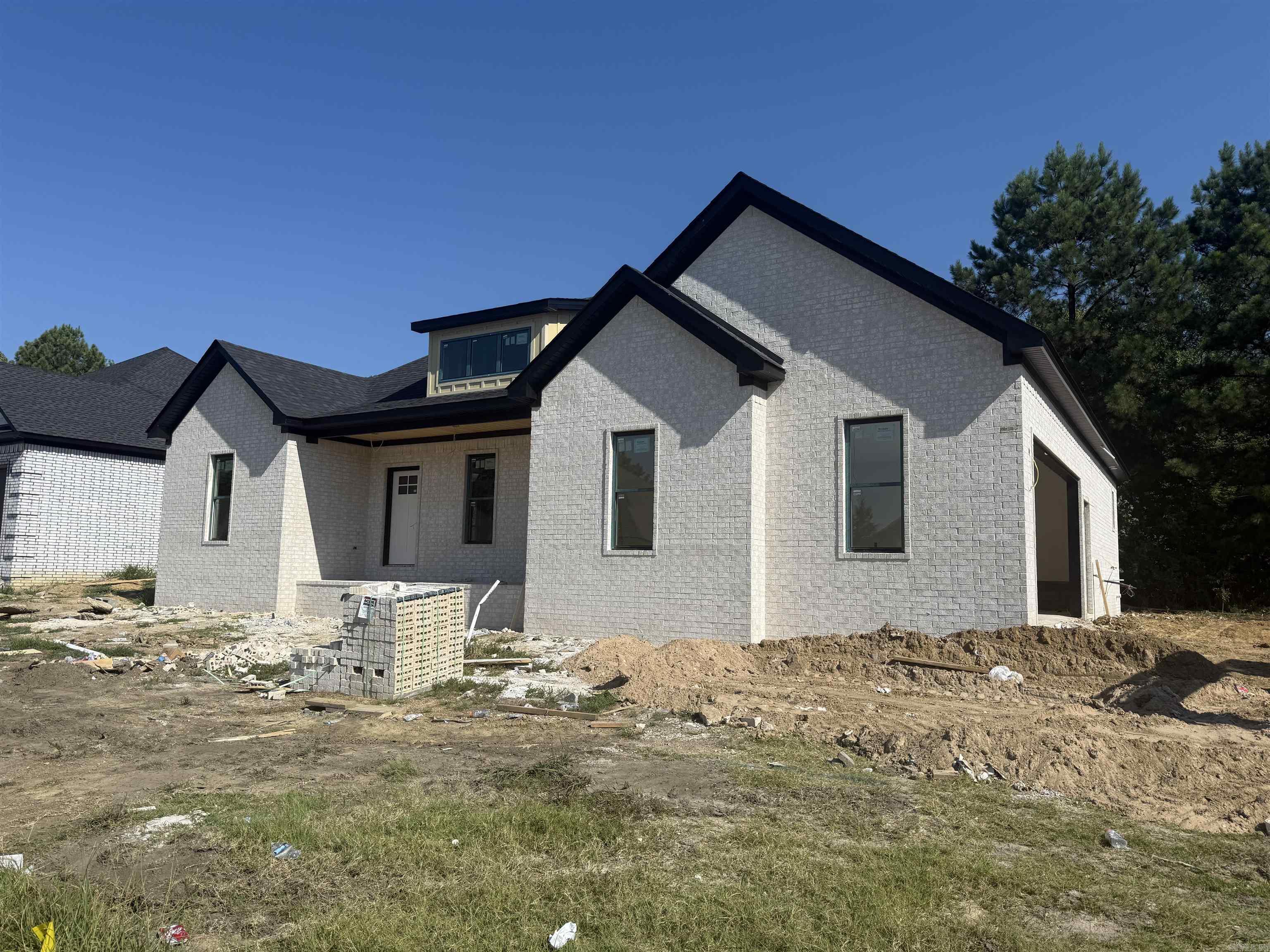 Welcome to 1 Ridge View! This 1815 sq ft new construction will have you living in both comfort and style. Enjoy the open floor plan with 3bed/2 bath, 10ft ceiling in the living/kitchen/dining area, luxury vinyl plank flooring thru out, granite counter-tops, tiled custom shower and large walk-in closet with built-in storage in the primary suite/bathroom, walk-in pantry, large garage with extra storage area and a nice back porch.