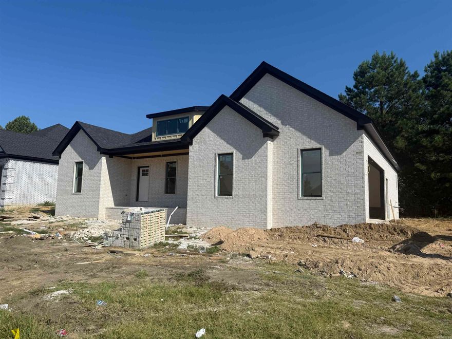 Welcome to 1 Ridge View! This 1815 sq ft new construction will have you living in both comfort and style. Enjoy the open floor plan with 3bed/2 bath, 10ft ceiling in the living/kitchen/dining area, luxury vinyl plank flooring thru out, granite counter-tops, tiled custom shower and large walk-in closet with built-in storage in the primary suite/bathroom, walk-in pantry, large garage with extra storage area and a nice back porch.