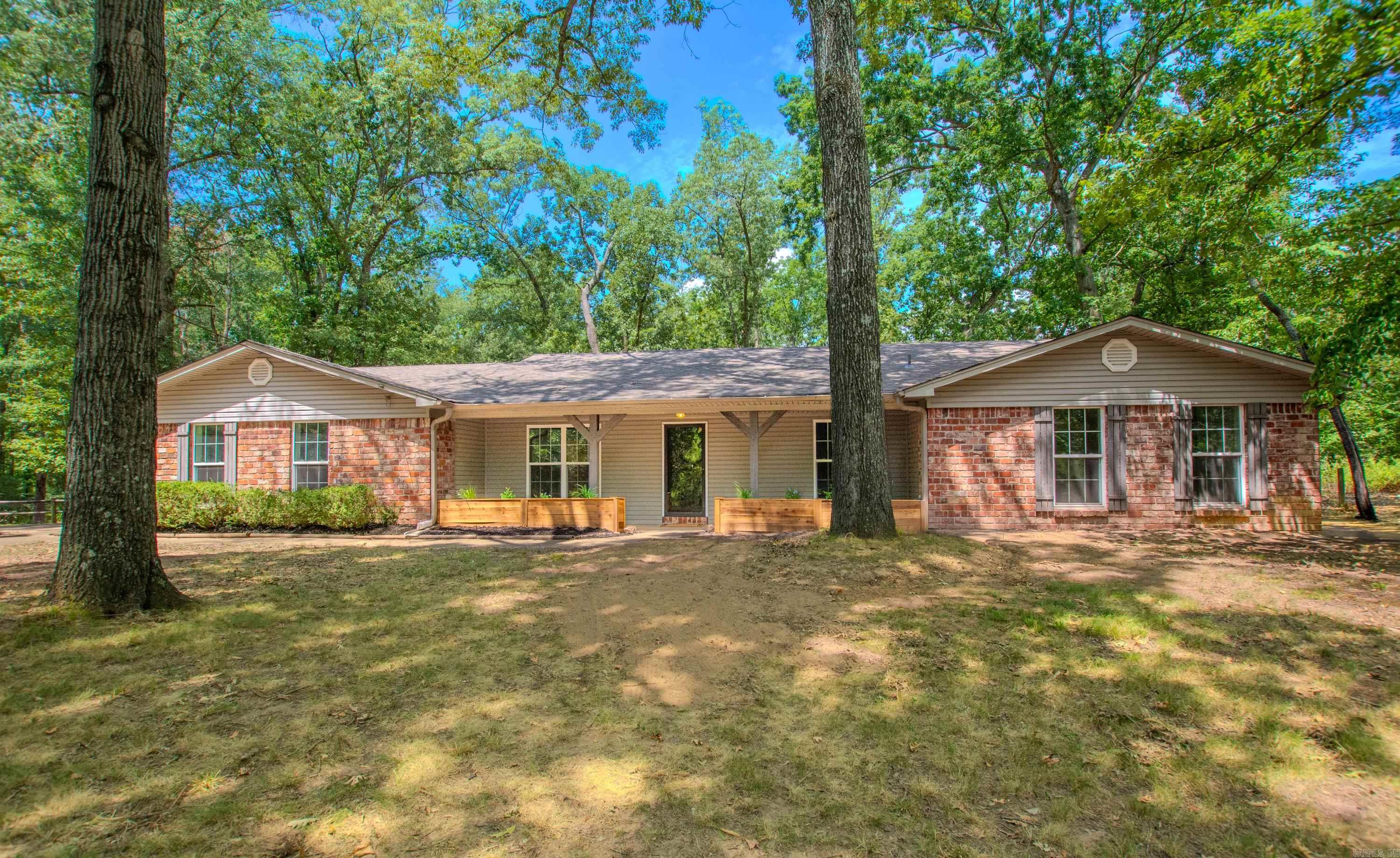 Welcome to your own private oasis! enjoy fishing on your private, fully stocked pond. Home comes with new paint, new light fixtures and fans, new carpet and fresh landscaping just to name a few. large shop equipped with electricity. Over 5 acres 4 bedrooms and 2.5 bathrooms, Eat in kitchen, formal dining room and two living spaces.