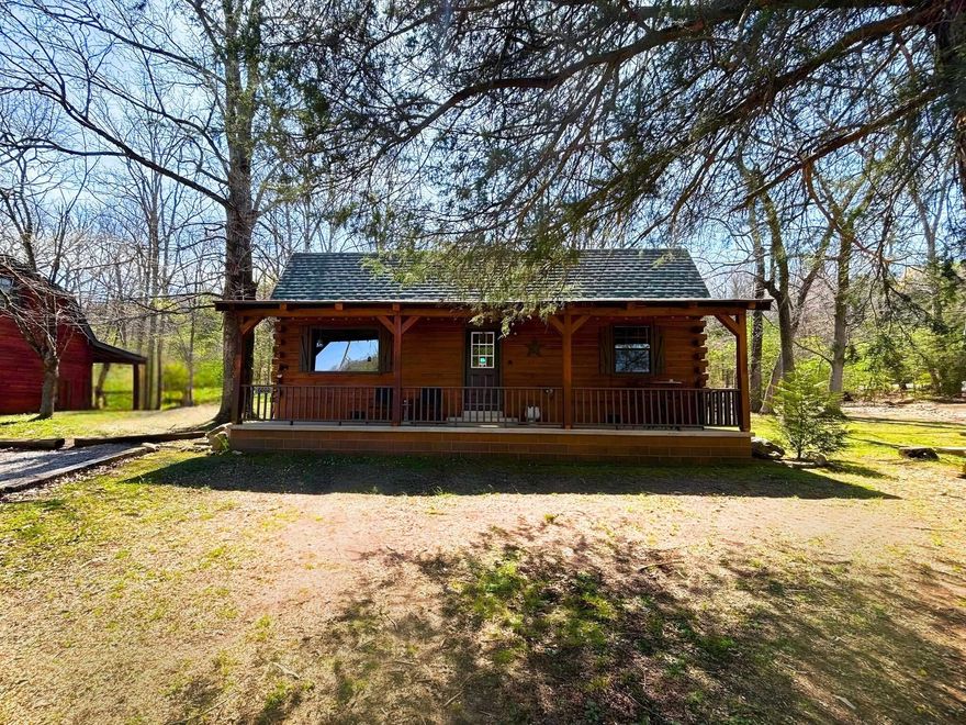 CABIN #2 is a charming two-story retreat offering 1,408 sq ft of space. It includes 2 bedrooms and a spacious loft area that can accommodate extra beds to be used as a 3rd bedroom or flex room, along with 2.5 bathrooms. The open concept living and dining area flows seamlessly into a fully equipped kitchen, complete with a washer and dryer. Cozy up next to the free-standing wood stove or relax on one of the two covered porches.  Can be leased fully furnished for an additional $300 per month.