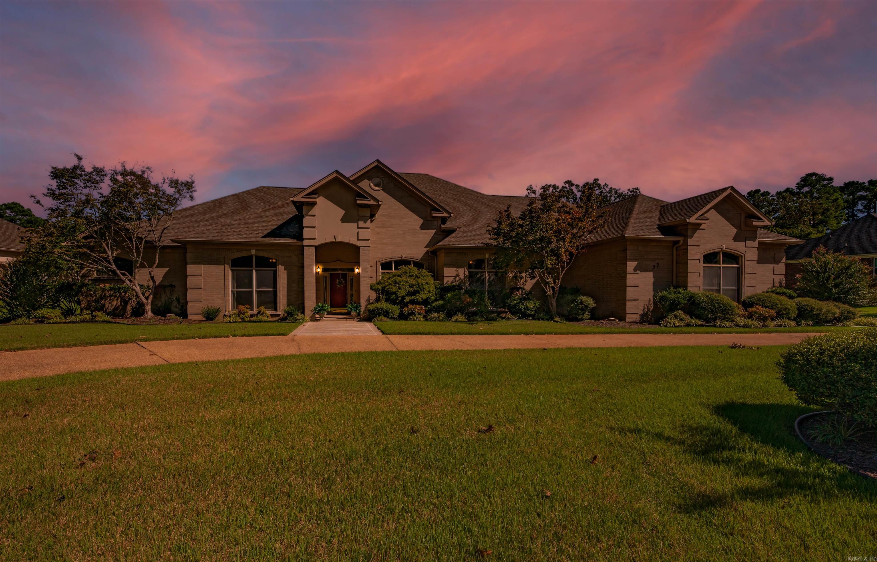 Have you dreamed about owning a home in Greystone? Now is your chance! Welcome to 37 Greystone Blvd! This custom built, one owner, builder’s personal home, sits on the Fairway of the 18th hole! This beautiful home boast beauty and detail that is found in very few homes! The 10’ ceilings, intricate crown molding, double pan ceilings, and Marathon water heater are just the beginning. No expense was spared in the construction of this home! With windows along the entire back, you can enjoy the view of the Fairway! The master bathroom is a room fit for royalty! Larger than most living rooms, this bathroom has separate vanities, his/her closets, corner jetted tub and a large cabinet/island that has plenty of drawers for additional storage. The kitchen is a dream come true with an abundance of cabinets! Designed to flow into the breakfast area and den, the large bar allows for cozy conversations and entertainment. In addition, three more bedrooms, two baths, large laundry room and an incredible, heated and cooled, sunroom top off this home. Outside sits an amazing 22x18 Gazebo, with room to add a pool! A new roof was installed in 2024, and the A/C replaced only two years ago!