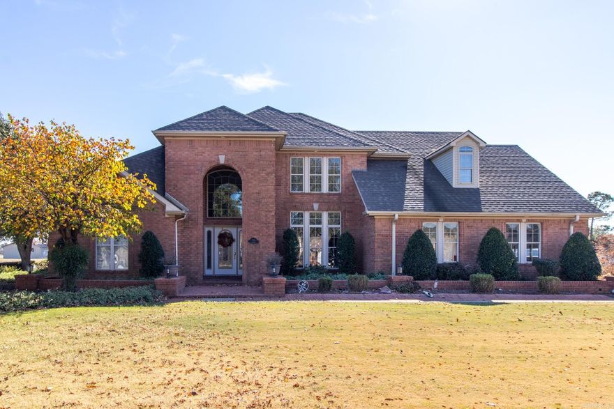 Beautiful 2 story, 4 Bedroom, 3 1/2 bath home on a corner lot is ready for new owners and is being sold FURNISHED AT NO ADDED COST TO THE BUYER! This home has been impeccably maintained and is a must see. Upon entry to the property, you're greeted by a large formal living/dining room combination with soaring ceilings. There is a dedicated office space just to the left of the front door that will accommodate all your office equipment. Straight ahead of the front entry is a french door that separates the formal living/dining room combination from the family room. The french door consists of glass panes that provides a more cozy feel to the family room while allowing a view of the living room. Adding to the cozy feel of the family room is a gas log fireplace that is a see-through type that opens to the kitchen/hearth room. The kitchen is a chefs dream and has lots of counter top space. The electric cooktop is located in an island with the wall oven and refrigerator conveniently placed nearby. There is a breakfast bar as well as space for A breakfast table. Lots of natural light floods the area making meal prep a breeze. There is a nice sized laundry room just off the kitchen.