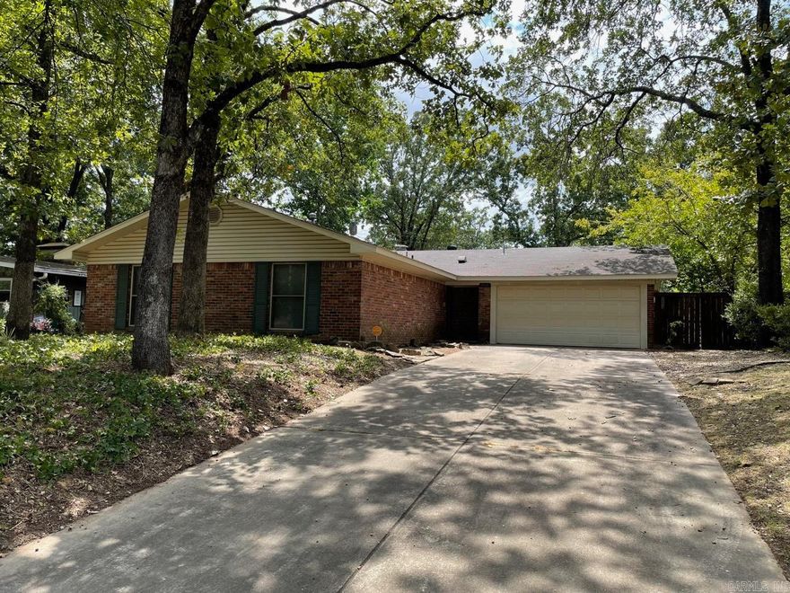 This well built home has so much potential and is located in a cozy neighborhood convenient to local shopping and restaurants. Each bedroom has good closet space and the primary includes a walk in shower.  The back yard is fully fenced and has a large Morgan metal building which will make a great place to build a work shop or to use as extra storage.  HVAC replaced in 2019. Vinyl double pane insulated windows and sliding door. Installation date, unknown  Property Sold "As Is" Please see Agent Remarks.