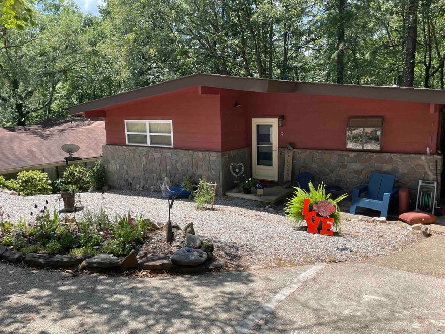 Simply precious! This well maintained home has so much to offer! Large living area that looks out over the covered deck to a lovely private oasis. Quiet circle means less traffic yet home is close to all amenities at West Gate! New water heater, 5 year old heat and air, new flooring. Beautiful maintenance free landscaping and home has been well loved. You have to see the shop downstairs that has been meticulously kept, along with tons of storage! 1 year home warranty offered by seller! HSV requires one time $1500 buy in fee. Don't miss this home it will be perfect for you!