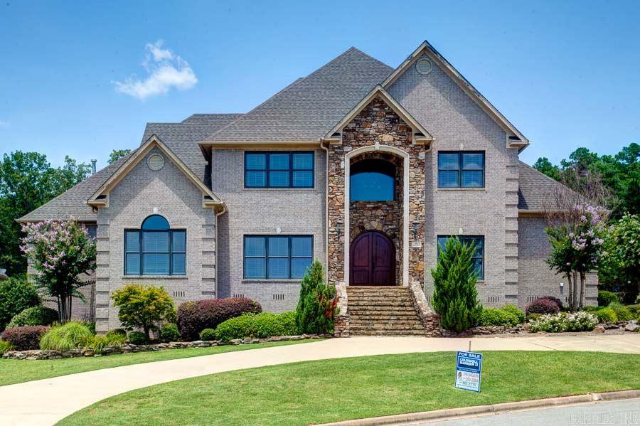 Custom built, versatile and elegant in gated neighborhood. Extensive crown, built-ins & spacious. Hardwoods, open floor plan, butler's pantry & bonus rooms up and down. Home theater, surround sound & office. Open kitchen with granite, ice maker, trash compactor, double oven & buffet. New Jack-n-Jill upstairs & new granite in all bathrooms/laundry. Circular drive, central vac & roof 2012. Large covered patio.