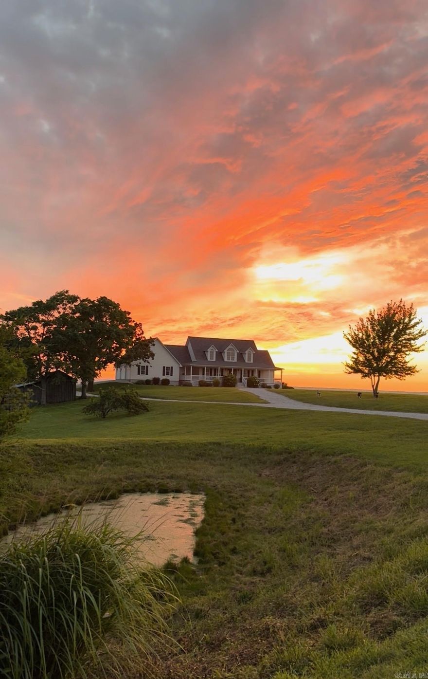 This amazing property offers 3 separate furnished living spaces with which 2 are already established Airbnb & VRBO nightly rentals as well as a working cattle/horse farm. Prop is just 6 miles from Buffalo River in Marshall, AR. This home hosts a panoramic view of the Ozark Mountain landscape with no obstructions for over 30 miles. Perched on top of 94 acres of farmland, this house sits in a class of its own with massive windows to view the stunning sunsets. The open concept floor plan creates a marquis entertaining space. Main house is essentially 2 homes in 1 & each level can be separated. Main level is a 2 bed/2 bath, laundry, large dining room, living room & kitchen with attached garage. Lower level has a full walk-out basement, 3 beds/1bath, full kitchen, laundry rm, large living rm/dining rm & large bonus closet. Lower-level suite (Victory Ranch Homestead) is an established rental on VRBO/Airbnb & generates consistent income. The property also features a 1 bed/1bath log cabin that is also an established VRBO/Airbnb called Victory Ranch Cabin. The views here are home to picture perfect sunsets hand-painted by God. Truly a one-of-a-kind, turnkey ranch, vacation rental and home.