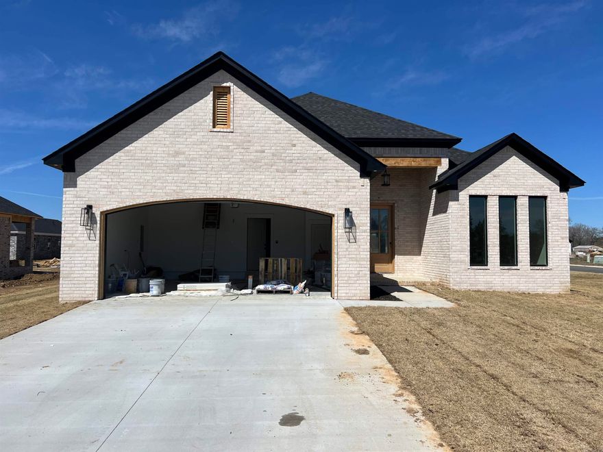 Come home to this beautiful new construction in the heart of Greenbrier! With open concept living area, granite countertops, a porch, a patio AND industrial strength LPV flooring, what more could you need from a custom built home!! Vaulted ceiling in the living room, BIG awesome moldings in the living and master bedroom. Master bedroom features a HUGE closet while the bathroom boast a lovely tiled, walk in shower. Even the laundry room has a granite folding table! Taxes estimated based off the lot. (under construction) (picture is an estimate on what it will look like)