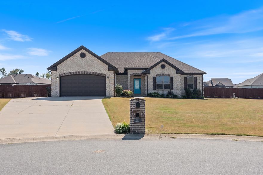 Beautiful all-brick home on a FULLY FENCED HALF-ACRE lot in Cabot! This 4-bed, 2.5-bath home offers the perfect blend of comfort, craftsmanship, and thoughtful design. The open layout features high ceilings, a welcoming living room with shiplap accents above the fireplace, gorgeous flooring and smooth flow throughout the main living areas. The kitchen shines with a brick accent wall, large island, walk-in pantry, and plenty of space for gathering and entertaining. The primary suite feels like your own spa retreat, with dual vanities, a soaking tub, and an oversized walk-in tiled shower that gives a true “luxury-suite” feel. A half bath adds extra convenience for guests—hard to find in this market! You’ll also love the custom drop-zone locker, spacious laundry room with added storage, and the inviting covered back porch overlooking a fully fenced backyard, perfect for guests, pets, or quiet evenings outside. A storage shed is another plus for this hard-to-find property! Schedule your private showing today!