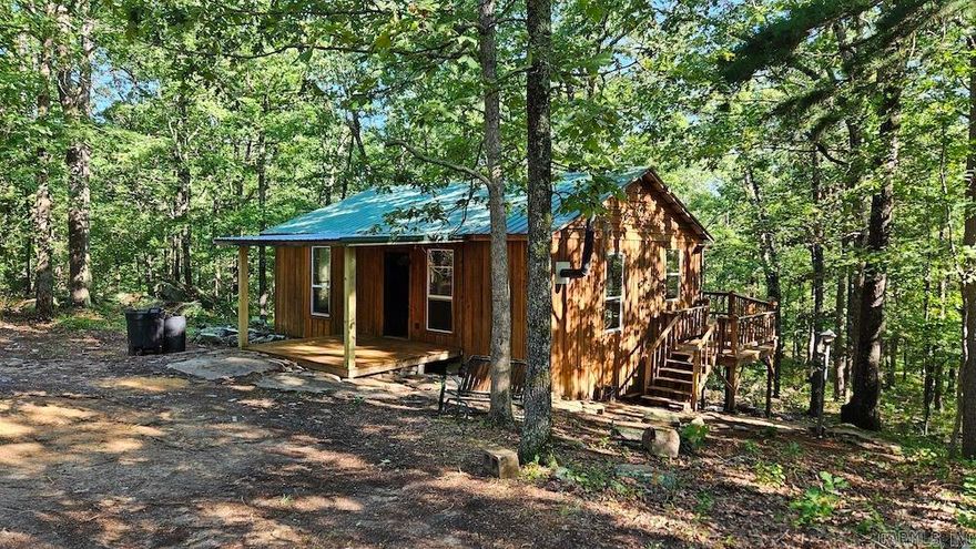You can’t miss this special cabin on some amazing hunting land full of character, raw Ozarks beauty, and seclusion. Laying in some remarkable rolling terrain, the cabin is super private and accessed by a deeded easement. Recently remodeled, this thing is ready for you to come put your finishing touches on it. The 2 bedroom/1 bathroom cabin has new lighting, some updated electrical and plumbing work, some new flooring, a completely new bathroom, new appliances, cleaned from top to bottom, new ceilings, new mini split heating and cooling, and more. The massive deck covers the back of the cabin, overlooking a serene wooded flat, and is partially covered. Being built partially on a massive boulder, it is both sound and solid. There is also fiber internet, so no matter if you are hunting, vacationing, or just getting away… you can always stay in touch with business or family. This picturesque setting has to be seen to be fully appreciated. The tract is comprised of mature and marketable hardwood timber and is absolutely beautiful. Mainly consisting of White Oak, Red Oak, Post, and Hickory, you will not believe the stand of timber this property possesses.