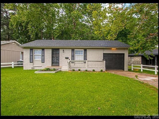 *LITTLE ROCK* CHARMING HOME IN MEADOW LARK SUBDIVISION!! This Newly Remodeled 3 Bedroom And 1 Bath Home Offers Over 1,000 Square Feet Of Comfortable Living Space! The Updated Kitchen Features Stone Countertops, New Cabinets and Flooring, Fresh Paint, And Comes Fully Equipped With A Gas Range, Refrigerator, Dishwasher, And Garbage Disposal, With A Spacious Dining Area Perfect For Family Meals! Enjoy Carpet, Wood, Vinyl, And Tile Floors Throughout The Home, Along With A Cozy Family Room! Central Heat & Air Provides Year-Round Comfort! A Washer And Dryer Are Included! Parking Is Easy With A 1 Car Garage, Parking Pad, And Street Parking Options! The Fenced Backyard Makes A Perfect Space For Relaxing Or Entertaining! OUTSIDE PET FRIENDLY!! AVAILABLE NOW!!!