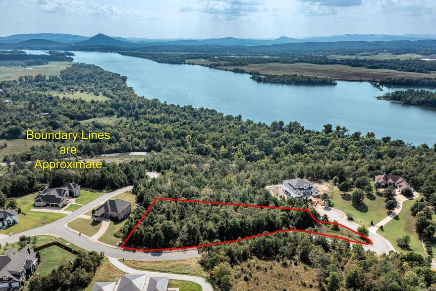 Wow! The views from this lot are spectacular. Once a home is built on this lot you may have a view of the Ar. River from every room. View of Pinnacle Mt. Incredible Sunsets when the river turns a red glow as the sunset reflects on the river. This is one of the largest lots available. Don't miss this opportunity.  An artist paints from this lot.  Once you see the view you will know why.  Under ground utilities water, electric, gas, sewer and att high speed internet. 2500 Minimum Sq. Ft to build. Gated but open Sat & Sun 1-4