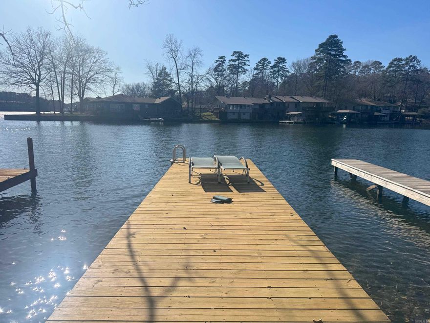 Walk outside your sliding back patio onto Lake DeSoto! This home has a private swim dock on the lake, which stays high all year long! The Village is home to multiple golf courses, lakes, hiking, and community events.  Whether this is your second home, vacation rental, or permanent home, you will love it. It's been renovated and it is ready for you!