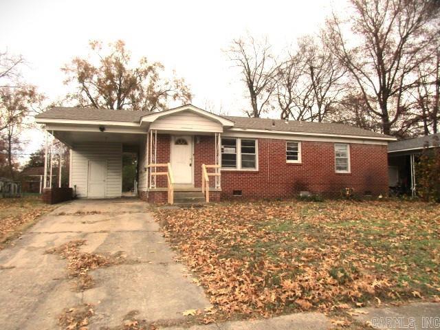 Investors take note of this brick/frame home. 3 bedrooms, 2 baths, 2 living areas, carport and outside storage. This home awaits your personal touches!! Call me today to view the home. Taxes are before Homestead Credit. **Agents See Remarks**