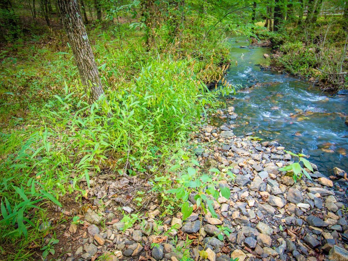 Beautiful 5 acre lot inside of the Waldenwood Subdivision. This gated community is just minutes from Costco and Kroger, but still outside of city limits and offers quiet country living! There is a gravel road started that leads to what would be the best build site. There is also a creek on the property. Come see it today!