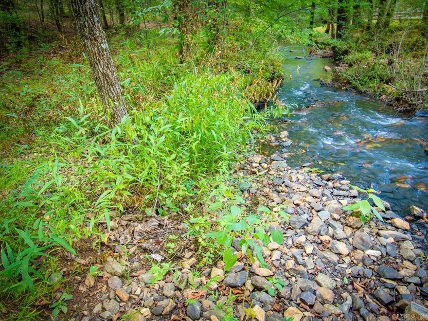 Beautiful 5 acre lot inside of the Waldenwood Subdivision. This gated community is just minutes from Costco and Kroger, but still outside of city limits and offers quiet country living!  There is a gravel road started that leads to what would be the best build site.  There is also a creek on the property.  Come see it today!