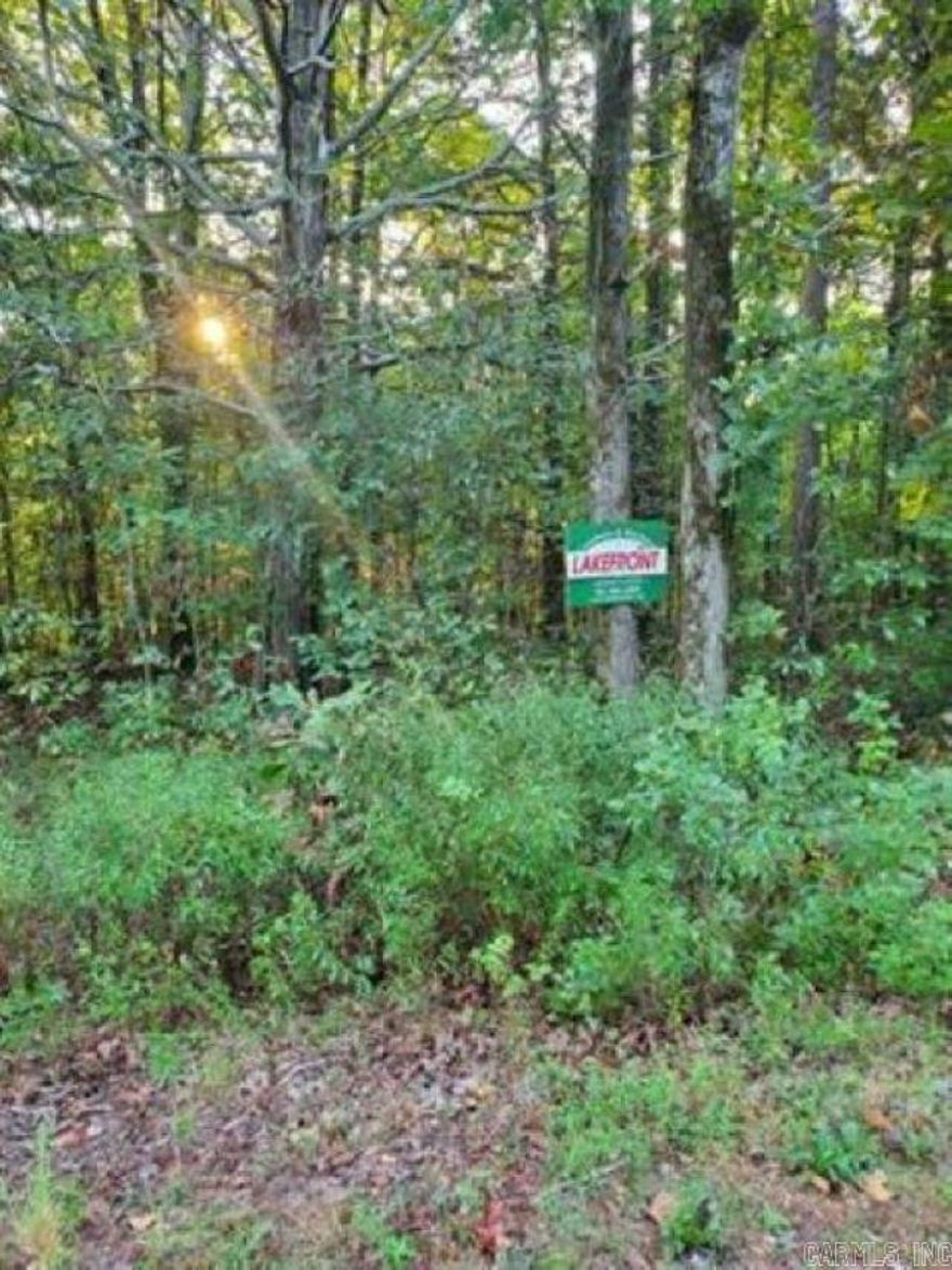 Very affordable lakefront lot in nice lakeside neighborhood close to the marina.  Nicely maintained homes on the street.  Good level spot within the lot for building.  Not many lakefront lots left at this price, so your buyers will want to jump on this.