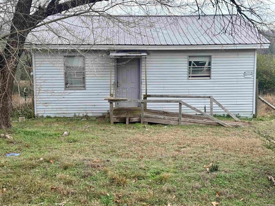One-bedroom investment opportunity on a spacious .39-acre lot. Seller began remodeling but was unable to complete the project, offering the next owner the chance to finish and add value. Property is being sold as-is. Ideal for investors or buyers looking for a renovation project with strong potential.