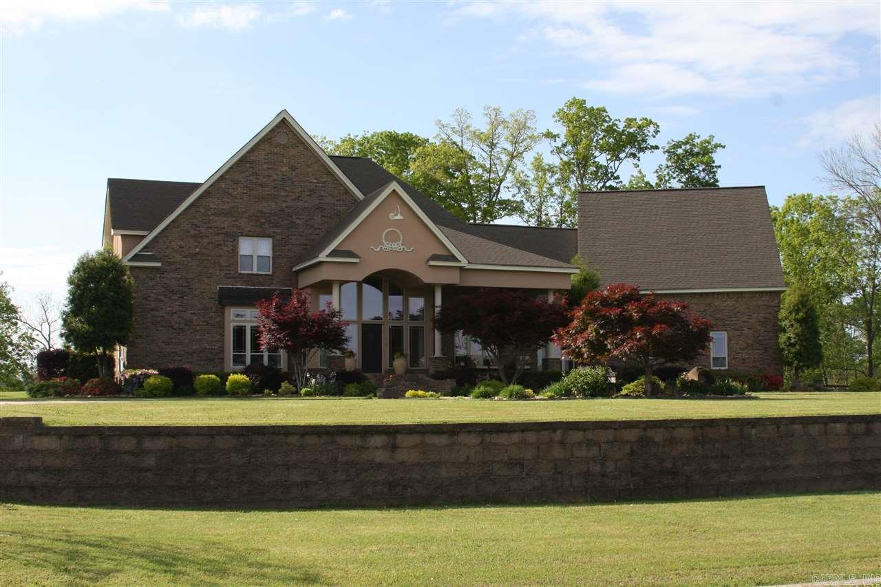 Stunning home and property! Mature trees, meadows and valleys are your backdrops. Safe room, massive gameroom, generous sized bedrooms, separate office, soaring ceilings, arched doorways, crown molding, tasteful colors. Steel frame construction, hardwoods, tile and carpet. Fabulous kitchen for the chef in the family! Four separate outdoor porches. Three car garage. Beautiful, peaceful place to start living your DREAM! Sold with 2501 Paradise LN., a 2150 sq ft, 3 bedroom, 2 bath, traditional style home.