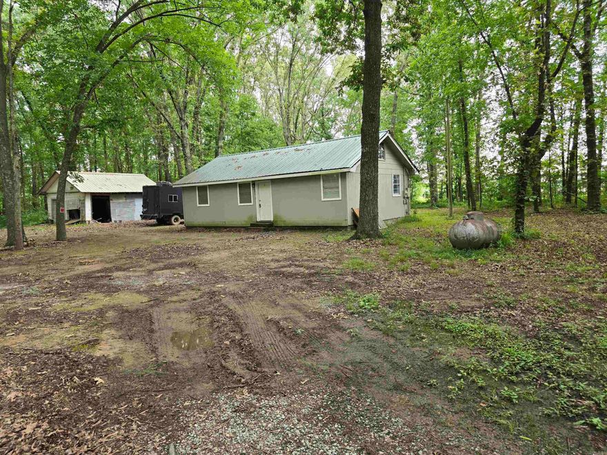 Quaint 2 bed, 1 bath home on 2.15 acres. Lots of trees for the added privacy. Comes with washer, dryer and refrigerator.
