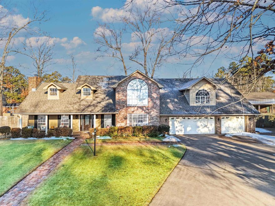 Great home for a large family or multi-generational living! Primary suite is on the main level and there's an additional half bath as well so guests don't have to use the primary. Upstairs there's 3 more large bedrooms and 2 baths, as well as an extensive attic and other storage areas. THAT'S NOT ALL!! The back porch has a covered walk that leads to the 3 car garage and a separate nearly 1,000 sq. ft. apartment. There you'll find a full kitchen, laundry, pantry, built-in bookcases, and it's very own primary suite with upscale bath and access to the garage. Perfect for in-law, guests, just about anyone who may need privacy and their own place but close to family. Handy workshop in the garage. The covered back porch overlooks the nicely manicured back yard, where it's obvious to see how much love has gone into the outdoor spaces.