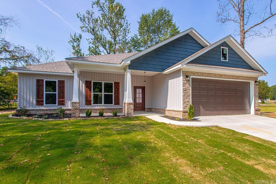 This beautifully crafted new construction exudes the timeless charm of a craftsman style, nestled on a generous .45-acre lot. Inside, you'll find a thoughtfully designed open floor plan that maximizes space and natural light. This home offers 3 spacious bedrooms and 2 modern bathrooms. The master suite is a true retreat, featuring a large walk-in closet and a luxurious en-suite bathroom equipped with a tub, shower, double vanity, and a private toilet room. Outside, this home is complete with a quaint front porch, covered back patio, and an expansive yard, perfect for morning coffees, entertaining, or evening relaxation. Don’t miss the opportunity to make this charming home your own!