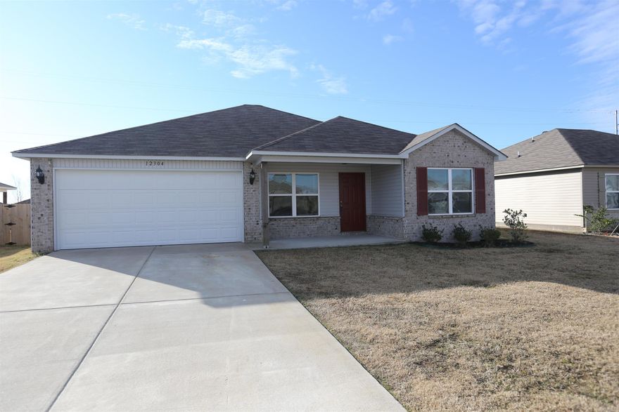 Welcome to 12304 Wahoo Drive, a stunning and contemporary residence nestled in the heart of North Little Rock, Arkansas. Built in 2021, this meticulously crafted home combines modern elegance with functionality, making it the perfect place for your family. This spacious home boasts four generously-sized bedrooms and two pristine bathrooms, offering ample space for both privacy and togetherness. The use of luxury vinyl plank flooring throughout not only adds a touch of luxury but also ensures easy maintenance, making this home both stylish and practical. The property's 2021 construction ensures that you'll enjoy the latest in design and technology, offering a comfortable and energy-efficient living environment. With its prime location in Benton, you'll have access to all the conveniences of city life while enjoying the serenity of this charming neighborhood. AGENTS SEE REMARKS.
