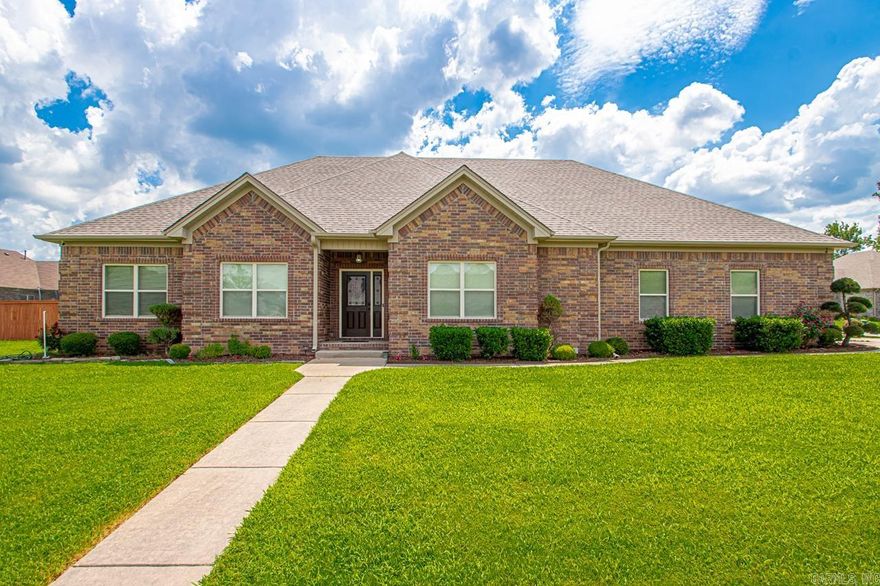 Step in to this beautiful 4 bedroom/2 bath traditional-style home offering 2,255 square feet of comfortable, one-level living. Built in 2015 and set on a desirable corner lot, this residence features a classic brick exterior, known for its low maintenance and timeless aesthetic, a new architectural shingle roof, known for its curb appeal, and a spacious epoxy floored two-car garage. Inside, enjoy a thoughtful blend of carpet, tile, and laminate flooring throughout the home. Don't forget the beautiful kitchen with a breakfast bar and convenient washer/dryer connections nearby. Relax outdoors with both a front porch and a back patio, all within a fully fenced backyard—perfect for entertaining or quiet evenings. With generous living space, new interior paint, modern features, and timeless curb appeal, this home offers comfort, style, and value in one smart package.