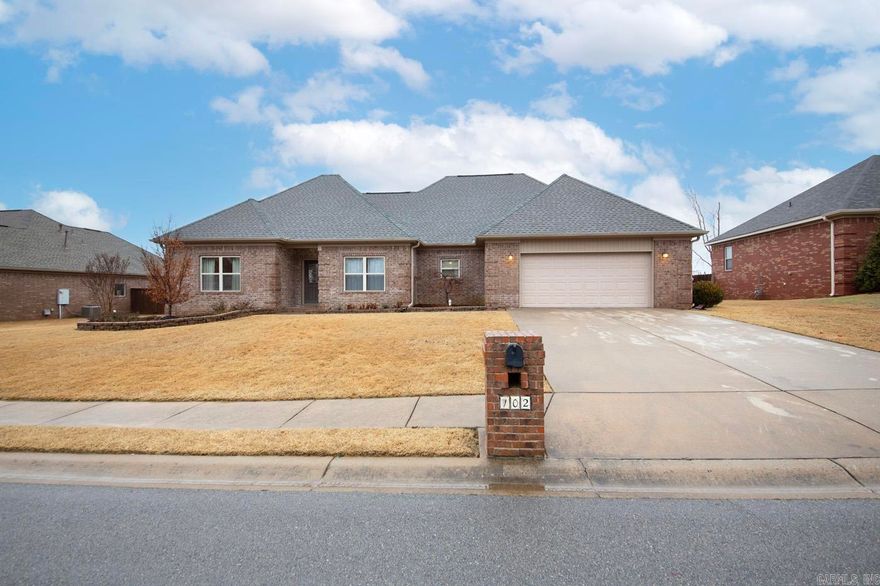 Welcome to 102 Hudson Branch!  Conveniently located close to the heart of Cabot with easy access to schools and 1-67!  Home features an open concept split floorplan with a formal dining room (this space could also be a perfect home office or flex space). Abundance of natural light and a cozy fireplace add to the charm of the home. Large kitchen with TONS of storage and counter space!! Kitchen features stained wood cabinets, granite countertops, stainless steel appliances, & pantry. The primary bath suite will sweep you away. Enjoy double vanities, a walk-in shower, deep jetted tub and private toilet closet. Large walk in closet with built ins provide ample storage.  The second and third bedrooms are set apart and are split by the tasteful guest bath and home has both a coat closet & linen closet.  The oversized covered back porch is perfect for grilling out and enjoying the evening sunsets!  Enjoy the backyard with extra landscaping and a little shop in backyard for those who love to tinker or need a little extra storage.  Don't miss the large laundry.  New paint, flooring and roof!  This home truly is a must see!