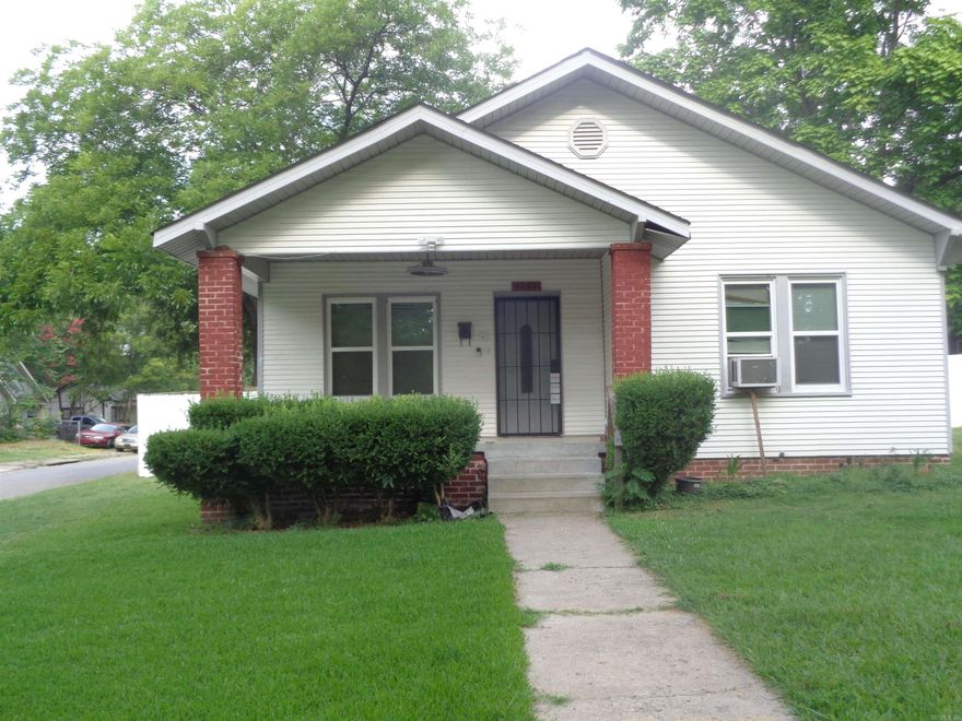 Roomy 2 bedroom, 1 bath home on a corner lot with a front porch. Formal living room, cozy dining room, laundry room and a fenced backyard. Kitchen stove will be furnished. Tenant provides own refrigerator. Tenant pays own water, gas and electrical utilities. Window units provided. No Pets/ Animals allowed. Housing Tenants Accepted. FIRST MONTH'S RENT IS 1/2 PRICE!!