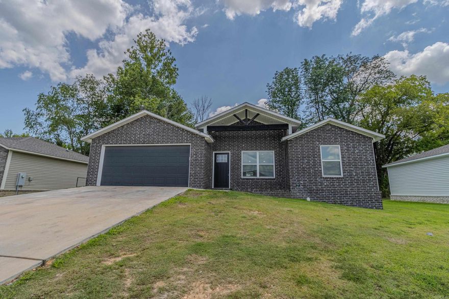 Agent-Owned | Modern Comfort Meets Style! Step into this beautifully maintained 3-year-old brick & siding home featuring a split floor plan for added privacy and an open-concept layout designed for both comfort and convenience. With 3 spacious bedrooms, 2 full baths, and an all-electric design on a solid slab foundation, this home offers zero wasted space and maximum efficiency. Enjoy elevated touches throughout, including decorative ceilings in the living room and primary suite, a luxurious ensuite with a whirlpool tub /shower, and a walk-in closet.  The kitchen and dining area flow seamlessly to a large back deck, perfect for summer grilling and chilling under the stars! Upgrades include :LVP flooring throughout, faux wood blinds, and sleek stainless & black appliances– everything you need to move right in.  **BONUS PERKS!** * Seller will contribute up to $5,000 in closing costs *1-year home warranty included for peace of mind * Brand-new privacy fence  Don’t miss this fantastic opportunity to own a home that’s better than new – schedule your tour today!