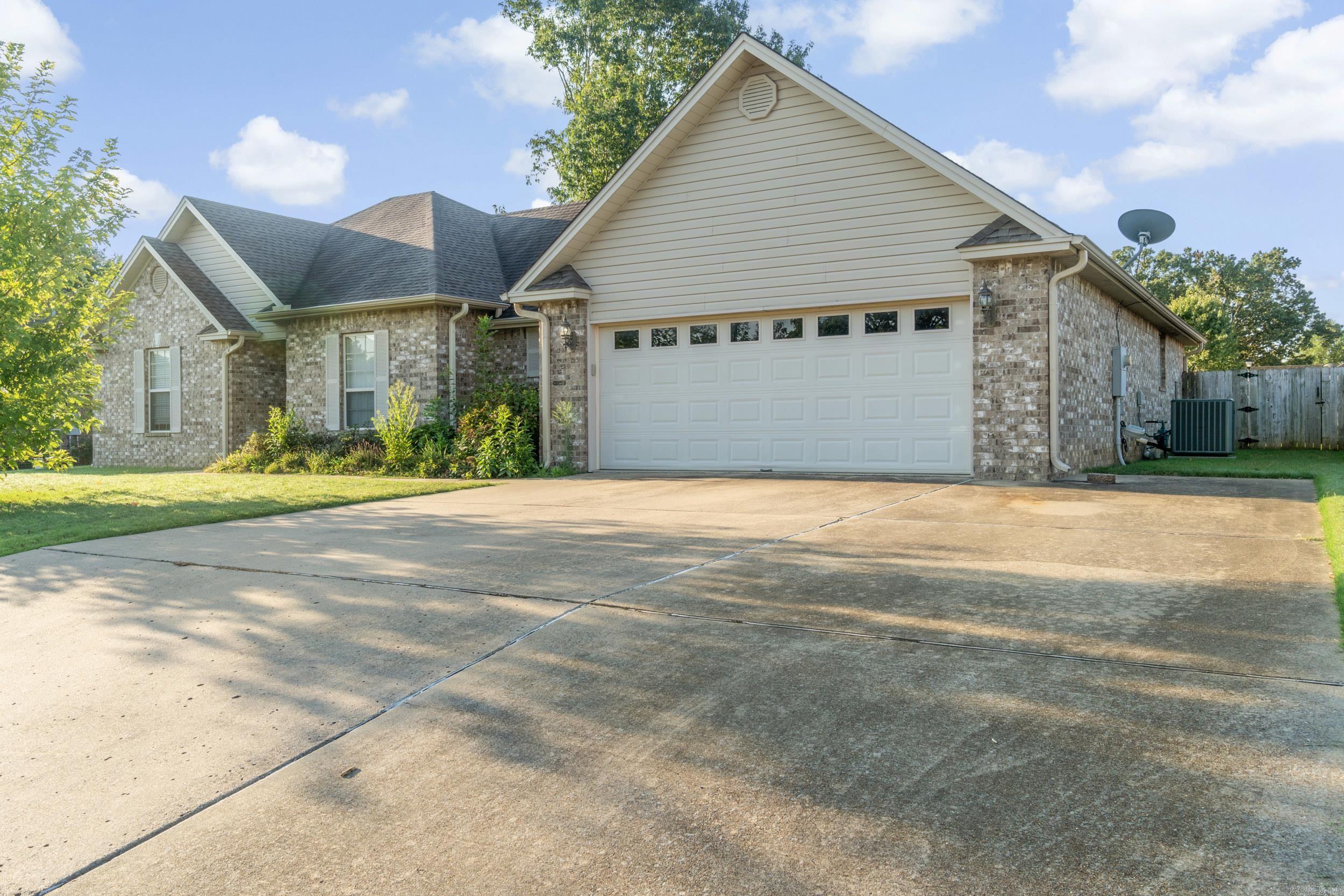 Beautiful & Well-Maintained Home in Searcy! This charming 3-bedroom, 2-bath home offers comfort, style, and convenience. Inside, you'll find a spacious split floor plan featuring a formal dining room, a cozy gas fireplace, and a kitchen complete with granite countertops. Step outside and enjoy the covered back patio, perfect for relaxing or entertaining. The property also features a 12'x24' shed, a raised flower/vegetable bed, and a privacy fence for added enjoyment. Major updates include a newer roof and HVAC system (2018), giving you peace of mind for years to come. Located in the desirable Valley Elms subdivision, this home is move-in ready and waiting for its next owner! Refrigerator conveys!