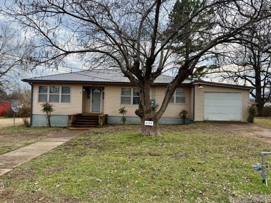 RENOVATED 3-4BR HOME!!  This 3-4 bedroom home has recently been partially renovated with new kitchen cabinets, pantry and sink. New bathroom vanity and toilet. New flooring and paint. New C/H/A in 2019 and new metal roof in 2017. Original hardwood floors.  New gutters in 2026.  1288 square feet including converted garage. There is a living room, dining room and kitchen combo, 3 bedrooms, 1 bathroom, large laundry room and a converted garage that can be a den or 4th bedroom! Sitting on .34 of an acre with a nice lawn and an older outbuilding. Close to schools and historic downtown Pocahontas!