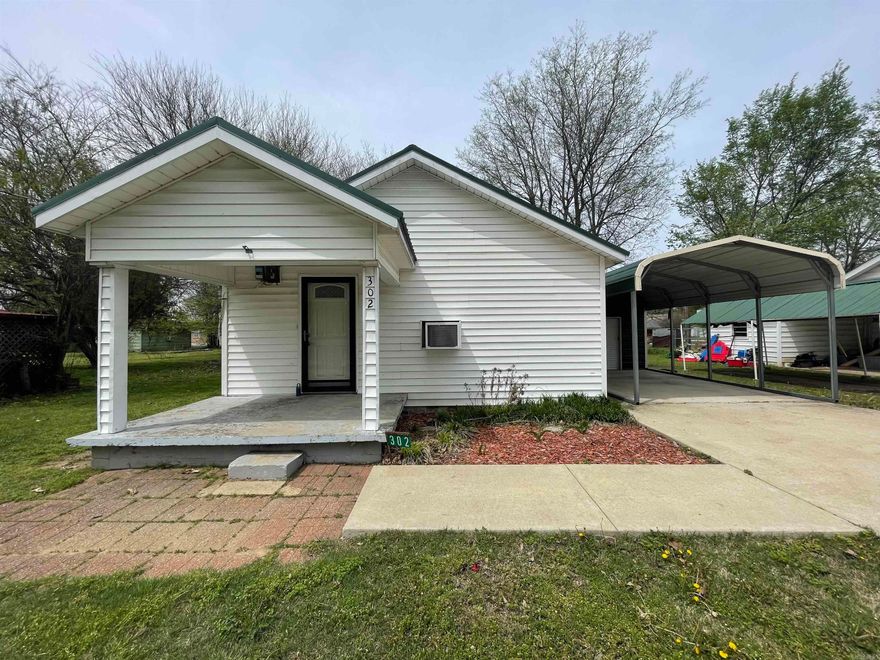 Charming home for sale in Bay! Small town living right outside of Jonesboro.  This home features 2 beds, 1 bath, 2 shops, fenced back yard and more!  Unique home that would make a great investment.