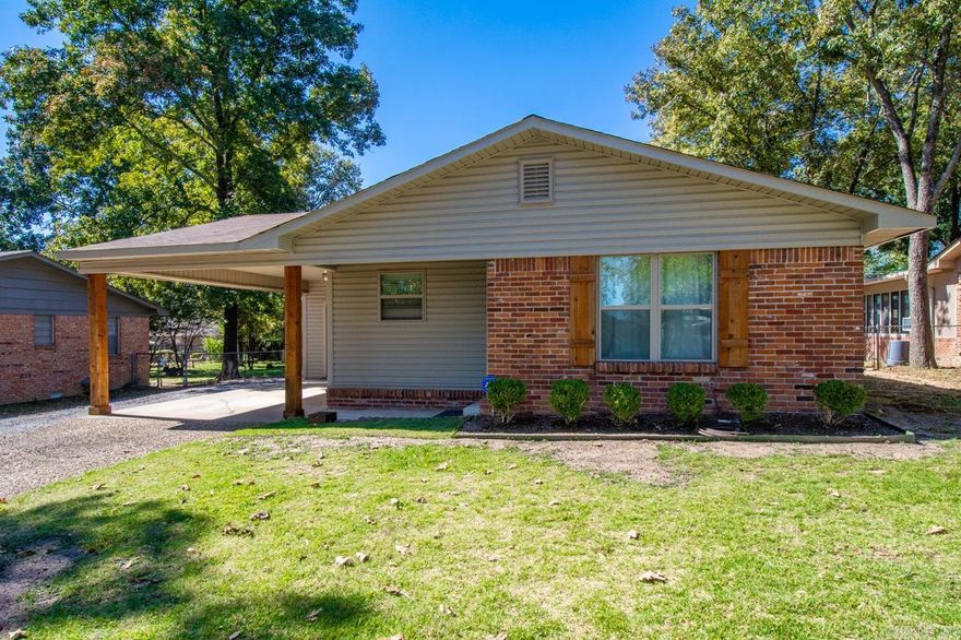 This Beautiful 3 bedroom, 2 bathroom home features a covered carport, storage shed, large fenced in yard, a kitchen island, refrigerator provided, and granite countertops.